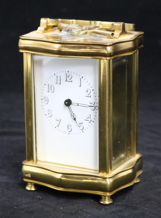 An early 20th century brass carriage timepiece